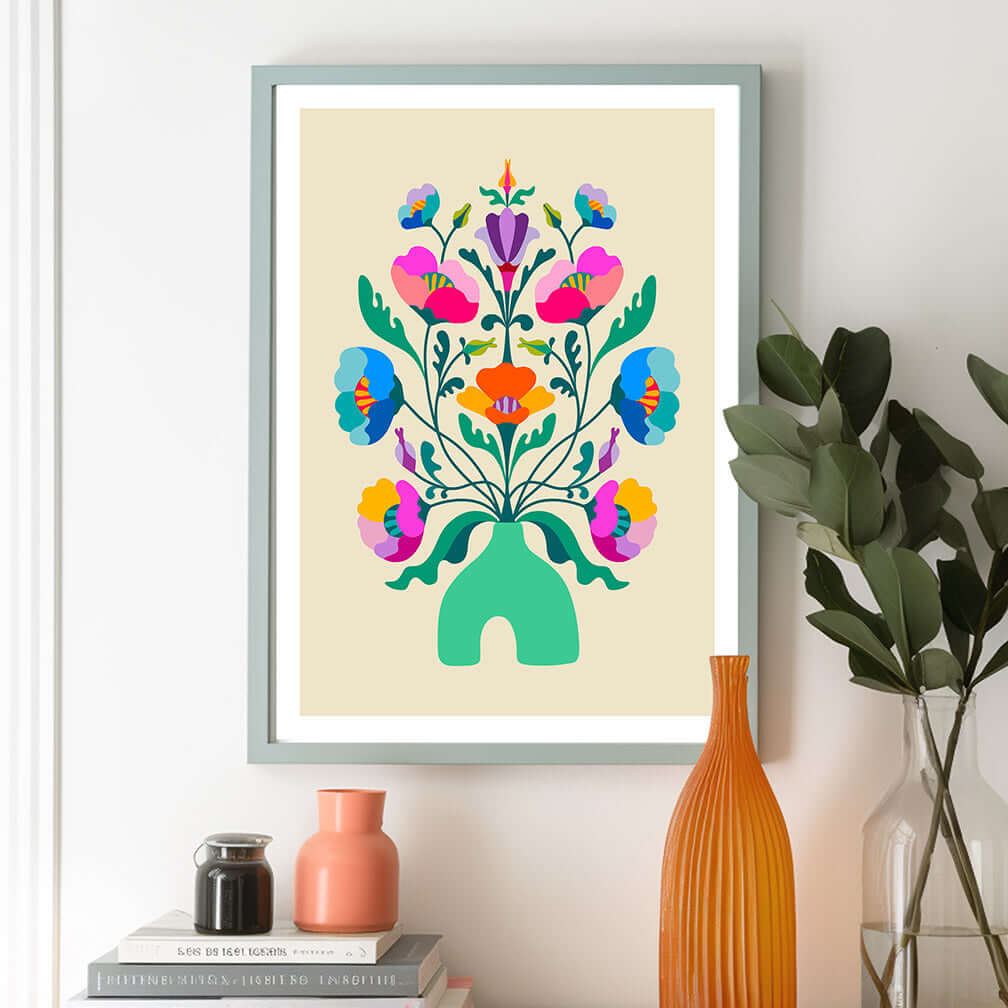 A vibrant floral print decorates the wall above a vase. Enjoy the beauty of this colorful floral wall art!