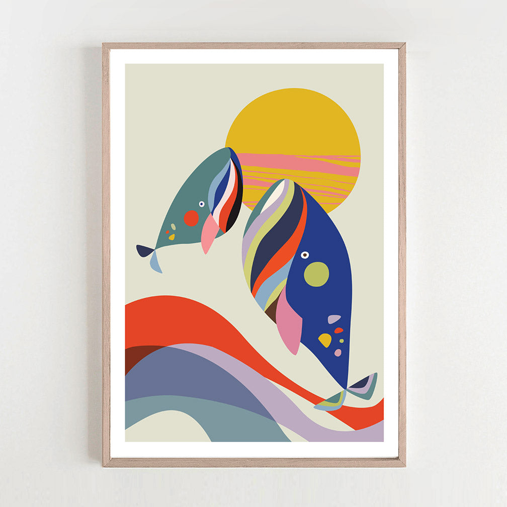 Colorful whales and sun abstract art print set against a sea background.