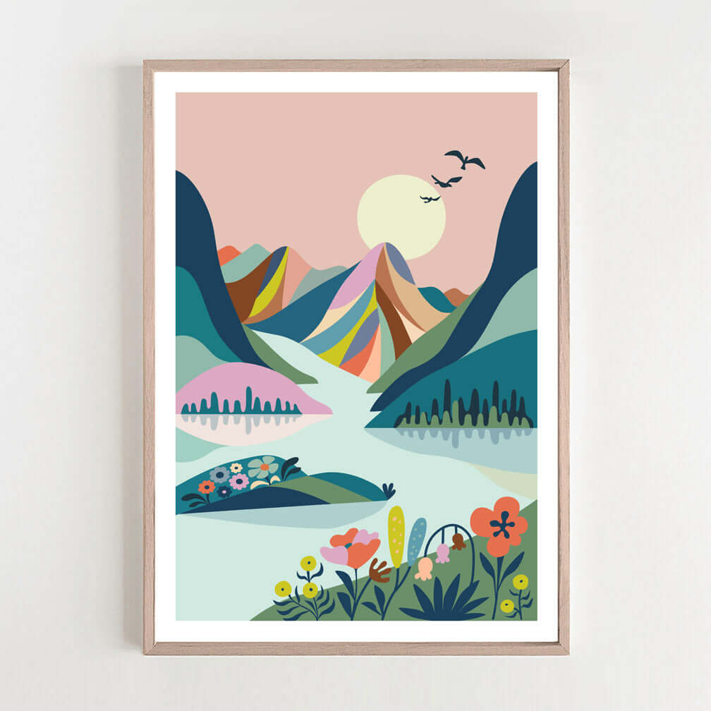 A vibrant mountain landscape print adorning a wall, showcasing the beauty of scenic mountains.