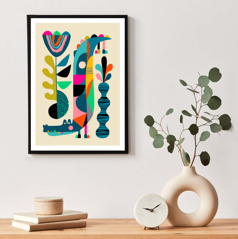 A vibrant abstract crocodile art print hanging on a wall, adding a burst of color and creativity to the space.