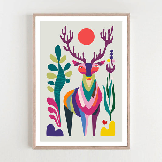 A framed deer art print on a white wall. The print showcases a beautiful deer in a natural setting.