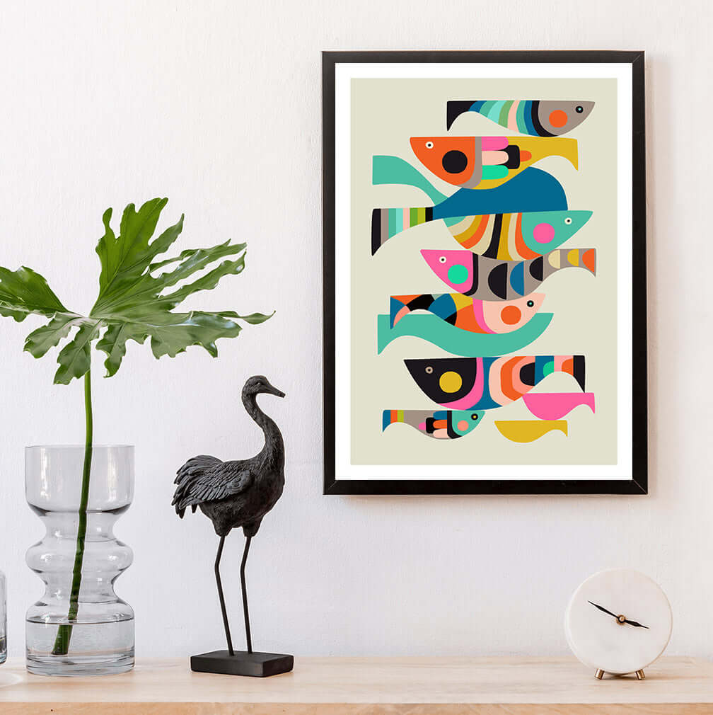 Framed art print featuring vibrant fish.