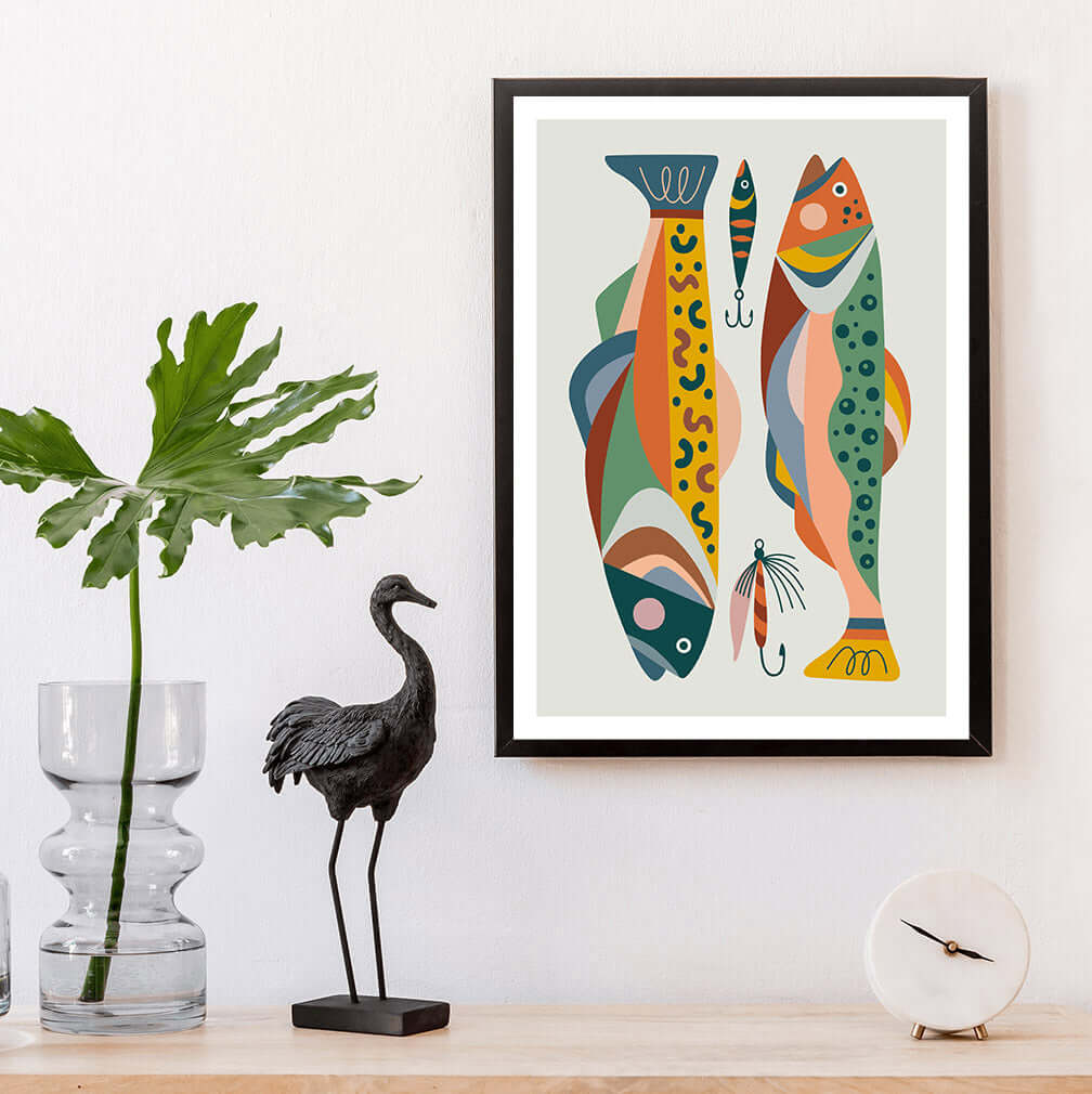 A captivating fish art print hanging on a white wall, adding a touch of elegance to any space.