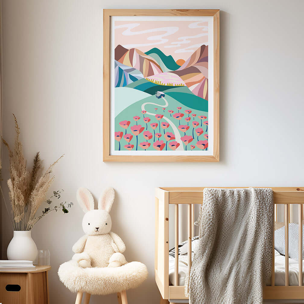 A cozy nursery room with a beautiful framed mountain print, creating a serene and peaceful atmosphere for the baby.