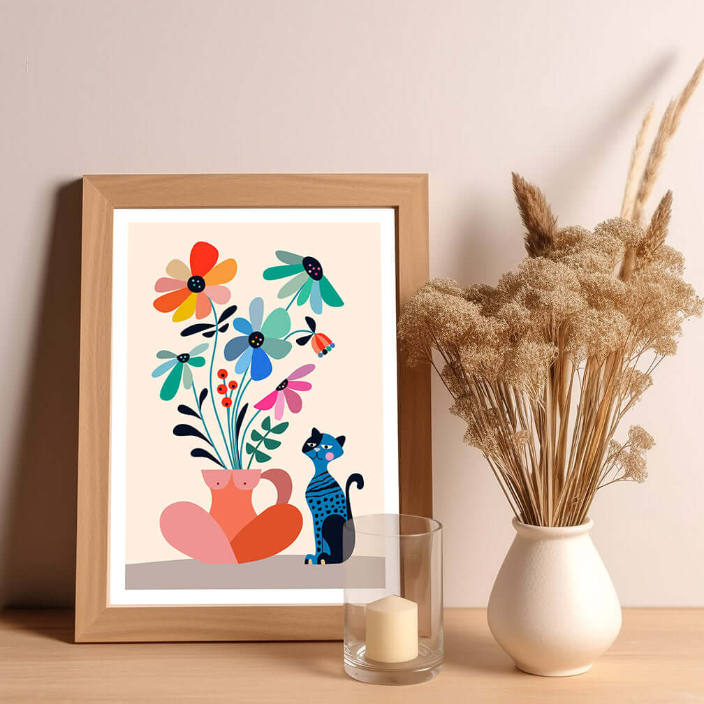 A framed art print featuring a cute cat surrounded by colorful Daisies..