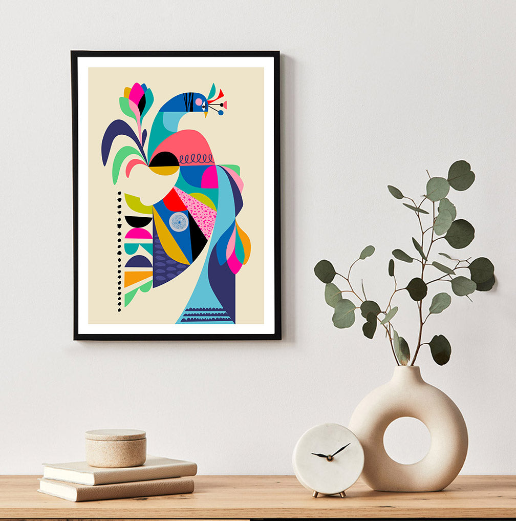 A vibrant abstract art print of a peacock, beautifully displayed on a living room wall.