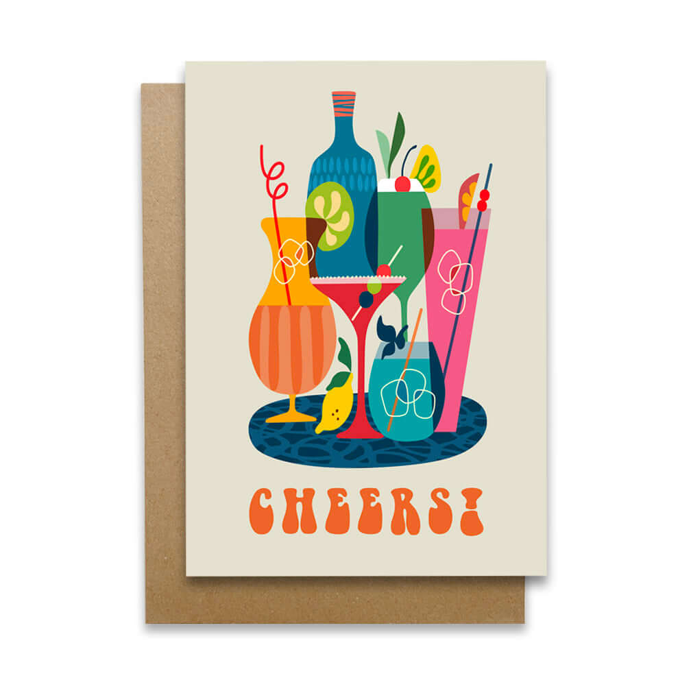 A Christmas card adorned with Colorful cocktails and drinks displayed on a table.