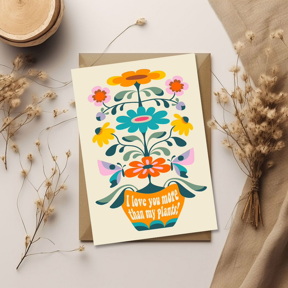 A beautiful floral greeting card featuring the message "I love you more than that plant".