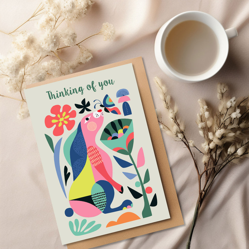 A charming bunny greeting card that says 'thinking of you.' Perfect for sending warm wishes and love.